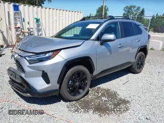2022 Toyota RAV4 Hybrid SE with VIN 4T3T6RFV7NU100943, listed as a IAAI auction lot 42621376 with 22,543 mi miles and . Bid and sale history available at DreamBid. Image 2.