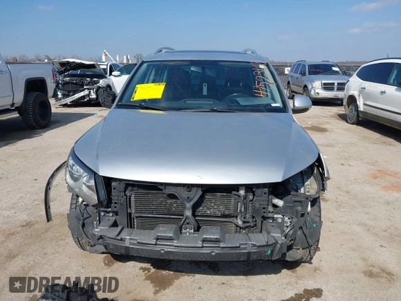 2013 Volkswagen Tiguan SE with VIN WVGAV7AX4DW545658, listed as a IAAI auction lot 41523168 with 188,729 mi miles and . Bid and sale history available at DreamBid. Image 13.