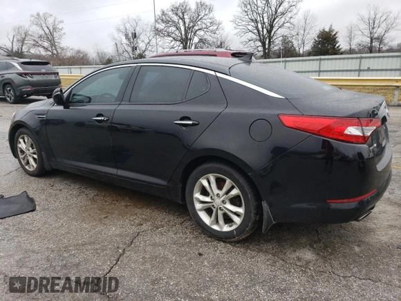 2012 Kia Optima EX with VIN 5XXGN4A65CG038188, listed as a Copart auction lot 42710865 with 180,346 mi miles and Salvage Title. Bid and sale history available at carsss.com. Image 2.
