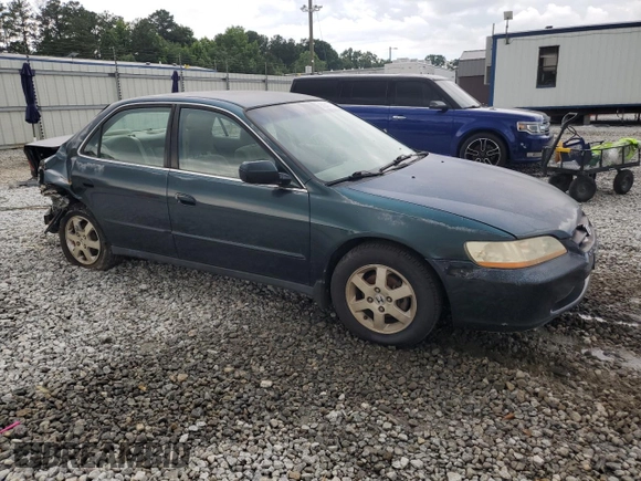 2000 Honda Accord SE with VIN 1HGCG5677YA049486, listed as a Copart auction lot 58548565 with 267,067 mi miles and Salvage title. Bid and sale history available at DreamBid. Image 4.