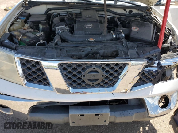 2007 Nissan Frontier SE with VIN 1N6AD06U57C410060, listed as a Copart auction lot 58255225 with 198,277 mi miles and Salvage title. Bid and sale history available at DreamBid. Image 11.