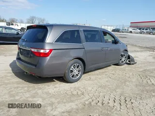 2013 Honda Odyssey EX-L with VIN 5FNRL5H62DB035649, listed as a IAAI auction lot 41849123 with 176,392 mi miles and . Bid and sale history available at carsss.com. Image 4.