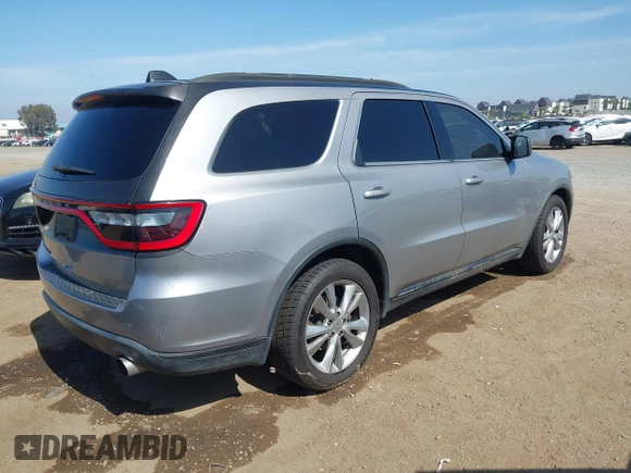 2014 Dodge Durango SXT with VIN 1C4RDHAG6EC593388, listed as a IAAI auction lot 42339302 with 170,746 mi miles and . Bid and sale history available at DreamBid. Image 4.