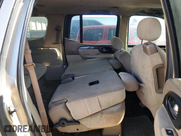 2004 GMC Envoy SLT z VIN 1GKET16S546133758, wystawiony jako Copart lot #76717674 z przebiegiem Nie podano mil oraz Szkoda całkowita • Salvage title. Historia ofert i sprzedaży dostępna na DreamBid. Obrazek 10.