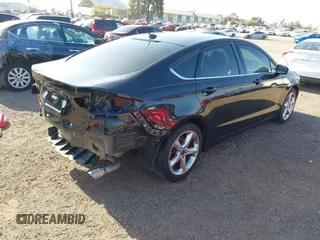 2014 Ford Fusion SE with VIN 3FA6P0HR7ER207927, listed as a IAAI auction lot 42094439 with 112,660 mi miles. Bid and sale history available at carsss.com. Image 4.