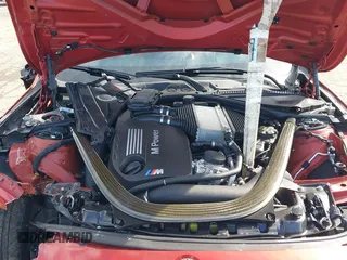 2015 BMW M4 with VIN WBS3R9C54FK329689, listed as a IAAI auction lot 41776061 with Not Provided miles. Bid and sale history available at carsss.com. Image 10.
