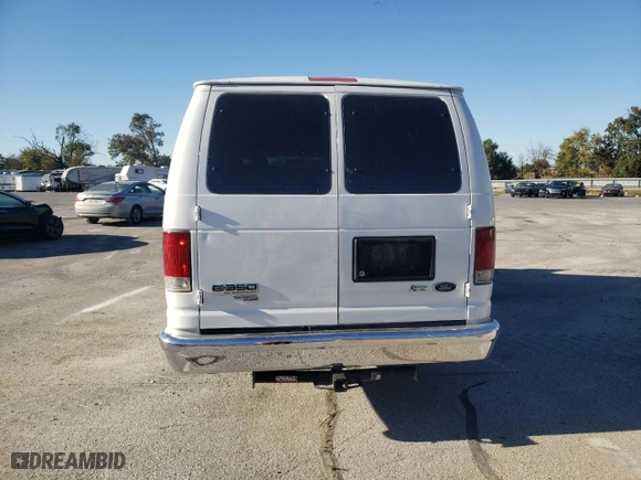 2010 Ford Econoline Wagon XL with VIN 1FBSS3BL6ADA82911, listed as a Copart auction lot 75835684 with 394,007 mi miles and Salvage Title. Bid and sale history available at carsss.com. Image 6.