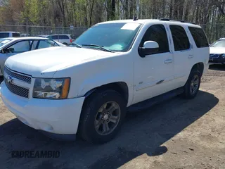 2007 Chevrolet Tahoe LTZ with VIN 1GNFK13007J149042, listed as a IAAI auction lot 41995090 with 216,748 mi miles and . Bid and sale history available at DreamBid. Image 2.