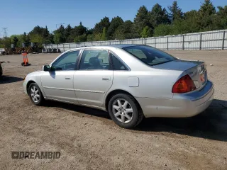 2000 Toyota Avalon XL with VIN 4T1BF28B5YU031947, listed as a Copart auction lot 56239265 with 167,627 mi miles and Salvage title. Bid and sale history available at DreamBid. Image 2.
