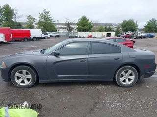 2014 Dodge Charger SE with VIN 2C3CDXBG8EH117241, listed as a IAAI auction lot 41952443 with 158,432 mi miles and . Bid and sale history available at DreamBid. Image 14.