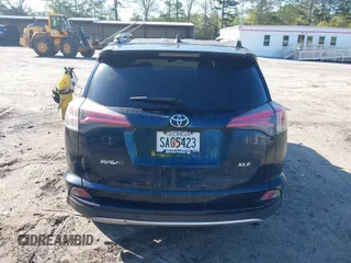 2018 Toyota RAV4 XLE with VIN JTMWFREV5JJ739619, listed as a IAAI auction lot 42017343 with 126,810 mi miles and . Bid and sale history available at DreamBid. Image 17.
