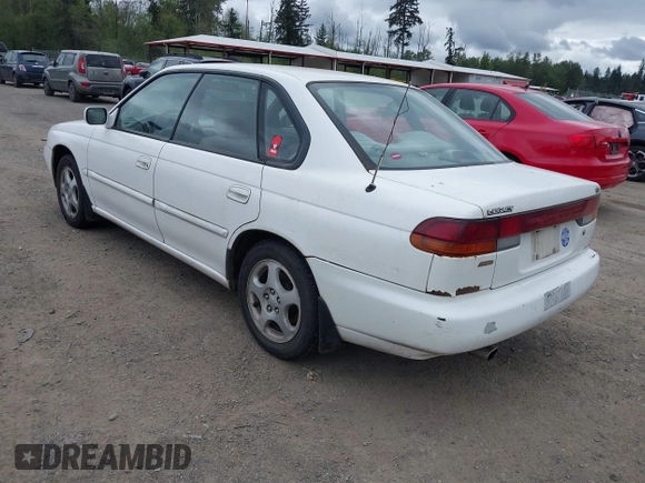 1996 Subaru Legacy with VIN 4S3BD4559T7202906, listed as a IAAI auction lot 42214410 with 211,118 mi miles and . Bid and sale history available at DreamBid. Image 3.