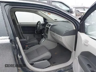 2007 Dodge Caliber SXT z VIN 1B3HB48B47D321277, wystawiony jako IAAI lot #41607140 z przebiegiem 159 286 mil mil oraz . Historia ofert i sprzedaży dostępna na DreamBid. Obrazek 5.