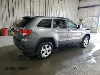 2013 Jeep Grand Cherokee Laredo with VIN 1C4RJFAG3DC612250, listed as a Copart auction lot 53155455 with 157,895 mi miles and Salvage Title. Bid and sale history available at carsss.com. Image 3.