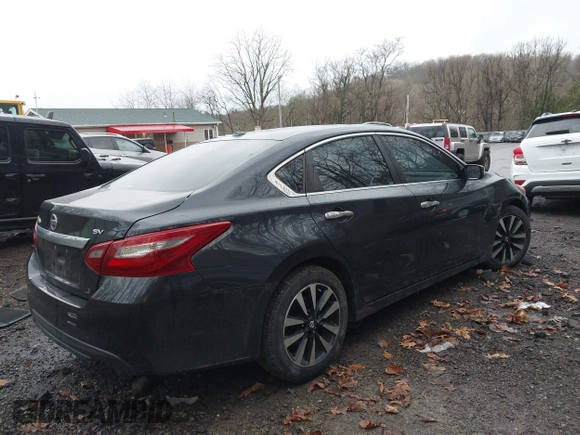 2018 Nissan Altima SV with VIN 1N4AL3AP3JC205875, listed as a IAAI auction lot 41892855 with 159,630 mi miles and . Bid and sale history available at DreamBid. Image 4.