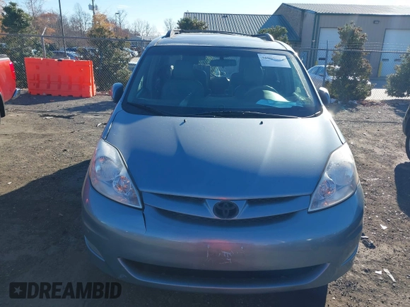 2010 Toyota Sienna XLE with VIN 5TDYK4CC6AS320562, listed as a IAAI auction lot 41005929 with 105,082 mi miles and . Bid and sale history available at DreamBid. Image 12.