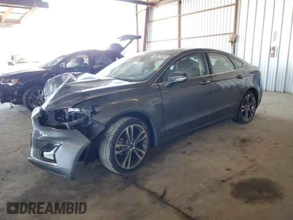 2020 Ford Fusion Titanium with VIN 3FA6P0K92LR115615, listed as a Copart auction lot 60471975 with 73,069 mi miles and Salvage title. Bid and sale history available at DreamBid. Image 1.