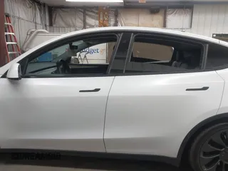 2023 Tesla Model Y Performance with VIN 7SAYGDEF5PF665560, listed as a IAAI auction lot 41809349 with Not Provided miles and . Bid and sale history available at DreamBid. Image 15.