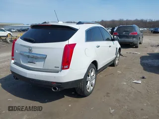 2015 Cadillac SRX Premium Collection with VIN 3GYFNDE38FS516009, listed as a IAAI auction lot 41785462 with 68,738 mi miles. Bid and sale history available at carsss.com. Image 4.