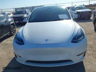 2023 Tesla Model Y Long Range with VIN 7SAYGAEEXPF598086, listed as a IAAI auction lot 41125984 with NaN miles. Bid and sale history available at carsss.com. Image 12.