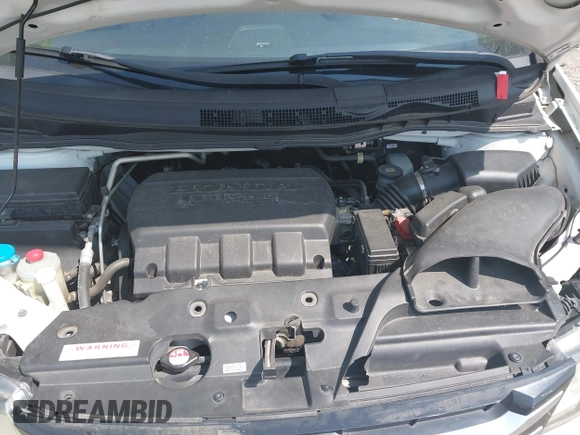 2014 Honda Odyssey EX-L with VIN 5FNRL5H63EB131596, listed as a IAAI auction lot 42402427 with 106,156 mi miles and . Bid and sale history available at DreamBid. Image 10.