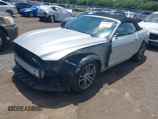 2017 Ford Mustang EcoBoost Premium z VIN 1FATP8UH6H5279739, wystawiony jako IAAI lot #42647755 z przebiegiem 91 724 mil mil oraz . Historia ofert i sprzedaży dostępna na DreamBid. Obrazek 18.