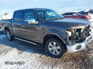 2015 Ford F-150 XLT with VIN 1FTEW1EP4FFC24409, listed as a IAAI auction lot 41306158 with 155,249 mi miles. Bid and sale history available at carsss.com. Image 1.