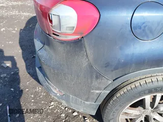 2014 Volkswagen Tiguan SE z VIN WVGAV3AX7EW541355, wystawiony jako IAAI lot #42032798 z przebiegiem 220 940 mil mil oraz . Historia ofert i sprzedaży dostępna na DreamBid. Obrazek 6.