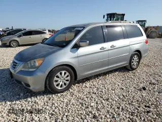 2009 Honda Odyssey EX-L with VIN 5FNRL38799B034292, listed as a Copart auction lot 52547205 with 116,658 mi miles and Salvage Title. Bid and sale history available at DreamBid. Image 1.
