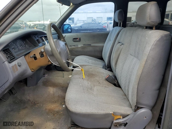 1997 Toyota T100 DX with VIN JT4TN12D7V0038238, listed as a Copart auction lot 79713824 with 233,756 mi miles and Salvage Title. Bid and sale history available at carsss.com. Image 7.