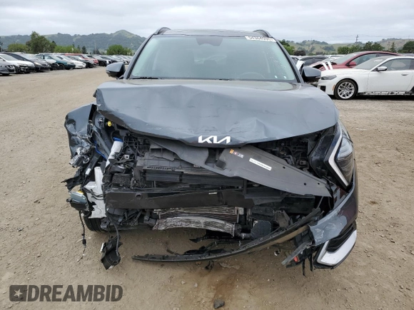 2023 Kia Sportage SX-Prestige with VIN KNDPXCAG1P7021044, listed as a Copart auction lot 54364995 with 38,023 mi miles and Salvage title. Bid and sale history available at DreamBid. Image 5.
