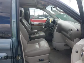 2006 Chrysler Town & Country LWB Touring with VIN 2A4GP54LX6R693048, listed as a IAAI auction lot 41887949 with 187,000 mi miles. Bid and sale history available at carsss.com. Image 5.