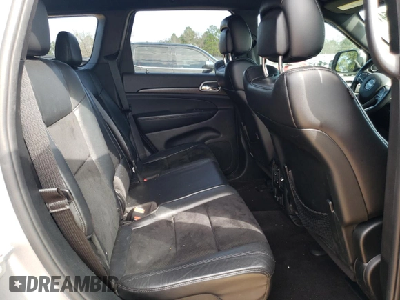 2018 Jeep Grand Cherokee Laredo E with VIN 1C4RJEAG2JC304458, listed as a Copart auction lot 45385415 with 102,172 mi miles and Salvage Title. Bid and sale history available at carsss.com. Image 12.