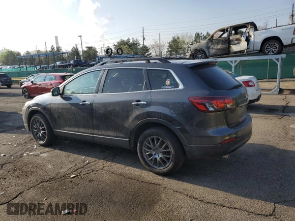 2015 Mazda CX-9 Grand Touring with VIN JM3TB3DV2F0453812, listed as a Copart auction lot 54445115 with 176,067 mi miles and Salvage title. Bid and sale history available at DreamBid. Image 2.