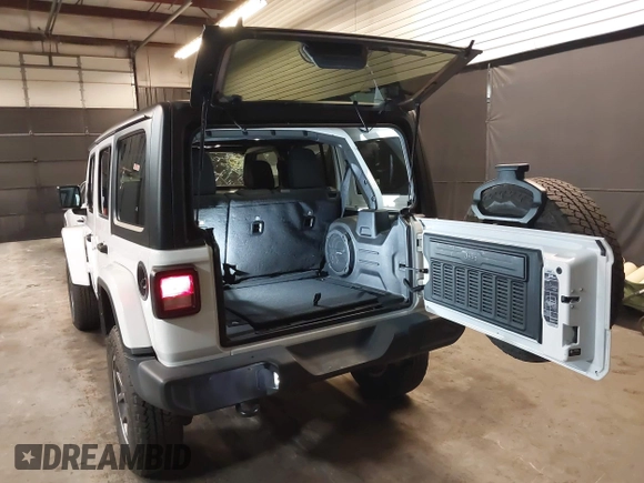 2021 Jeep Wrangler Unlimited Freedom with VIN 1C4HJXDNXMW681267, listed as a IAAI auction lot 42026181 with 40,143 mi miles and . Bid and sale history available at DreamBid. Image 3.