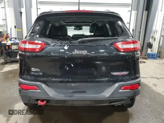 2014 Jeep Cherokee Trailhawk with VIN 1C4PJMBS5EW294212, listed as a Copart auction lot 88816885 with 151,779 mi miles and Salvage title. Bid and sale history available at DreamBid. Image 6.