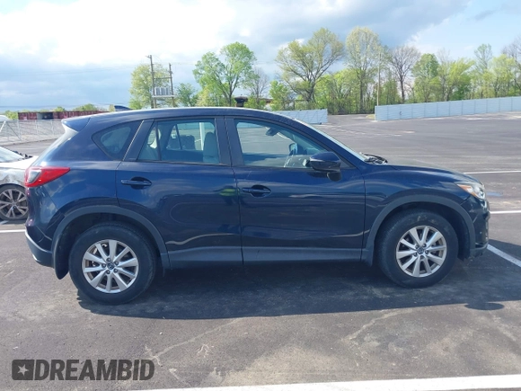 2016 Mazda CX-5 Sport with VIN JM3KE2BY3G0740488, listed as a IAAI auction lot 42000449 with 43,009 mi miles. Bid and sale history available at carsss.com. Image 13.