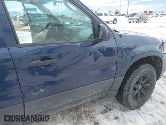 2003 Ford Escape XLS Popular with VIN 1FMYU92153KE01890, listed as a IAAI auction lot 41605087 with 109,411 mi miles. Bid and sale history available at carsss.com. Image 18.