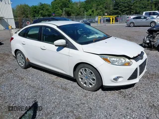 2012 Ford Focus SE z VIN 1FAHP3F27CL218986, wystawiony jako IAAI lot #42633997 z przebiegiem 163 414 mil mil oraz . Historia ofert i sprzedaży dostępna na DreamBid. Obrazek 1.