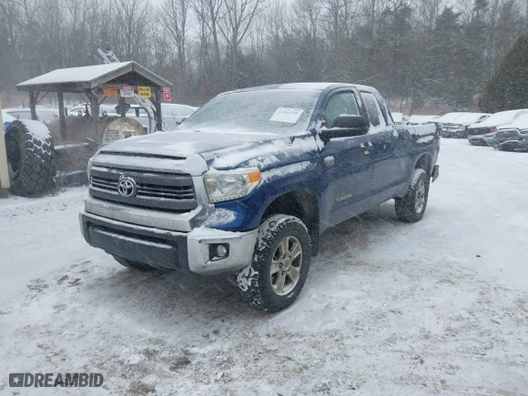 2014 Toyota Tundra 4WD Truck SR with VIN 5TFUY5F18EX392859, listed as a IAAI auction lot 41264709 with 186,881 mi miles. Bid and sale history available at carsss.com. Image 2.