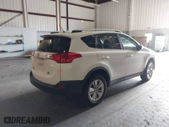 2014 Toyota RAV4 LE with VIN JTMBFREV8EJ005559, listed as a IAAI auction lot 41963080 with 126,296 mi miles and . Bid and sale history available at DreamBid. Image 4.