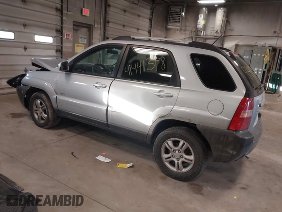2005 Kia Sportage LX with VIN KNDJE723X57071792, listed as a IAAI auction lot 41441318 with 249,652 mi miles and . Bid and sale history available at carsss.com. Image 3.