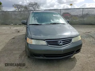 2004 Honda Odyssey EX-L with VIN 5FNRL18944B052617, listed as a Copart auction lot 51443625 with 144,346 mi miles and Salvage Title. Bid and sale history available at DreamBid. Image 11.