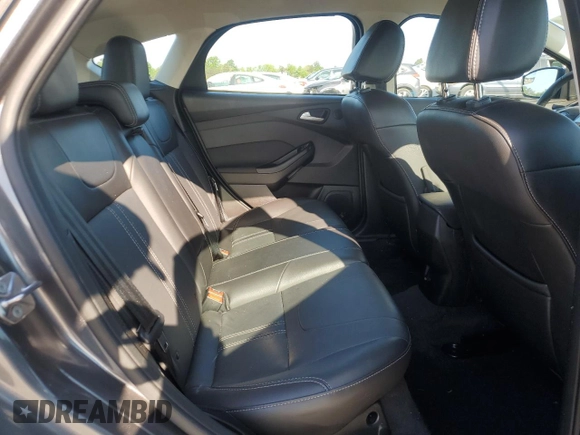 2014 Ford Focus Titanium with VIN 1FADP3N24EL269008, listed as a Copart auction lot 56396975 with 116,856 mi miles and Salvage title. Bid and sale history available at DreamBid. Image 10.