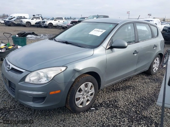 2010 Hyundai Elantra Touring GLS with VIN KMHDB8AE2AU051834, listed as a IAAI auction lot 41556140 with 107,206 mi miles. Bid and sale history available at carsss.com. Image 2.