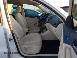 2010 Volkswagen Tiguan SEL with VIN WVGBV7AX4AW514362, listed as a IAAI auction lot 41413300 with 154,201 mi miles and . Bid and sale history available at DreamBid. Image 5.