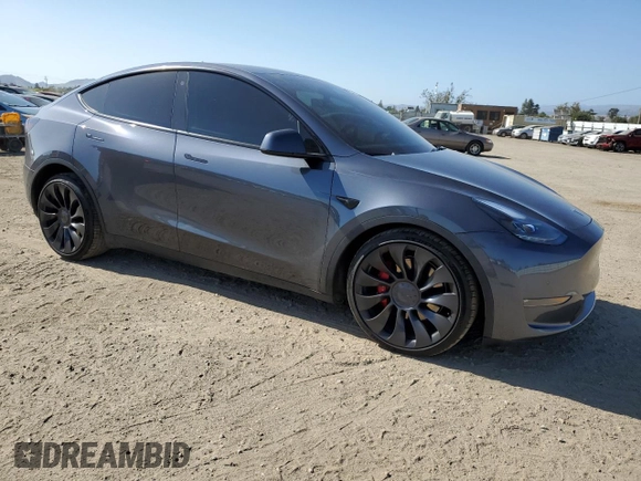 2022 Tesla Model Y Performance with VIN 7SAYGDEFXNF521502, listed as a Copart auction lot 56132745 with 73,339 mi miles and Salvage title. Bid and sale history available at DreamBid. Image 4.