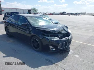 2013 Toyota Avalon XLE z VIN 4T1BK1EB4DU021446, wystawiony jako IAAI lot #42271683 z przebiegiem 214 275 mil mil oraz . Historia ofert i sprzedaży dostępna na DreamBid. Obrazek 1.