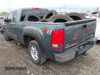2009 GMC Sierra 1500 SLE with VIN 1GTEK29009Z214672, listed as a IAAI auction lot 41941003 with 165,546 mi miles. Bid and sale history available at carsss.com. Image 3.
