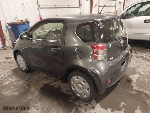 2012 Scion iQ with VIN JTNJJXB03CJ019403, listed as a IAAI auction lot 41543384 with 110,749 mi miles. Bid and sale history available at carsss.com. Image 3.